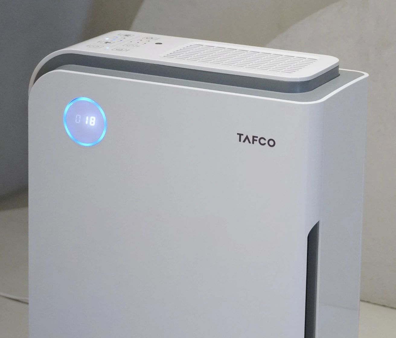 TAFCO AirSHEL 058 air purifier in a bedroom for cleaner air while you sleep.